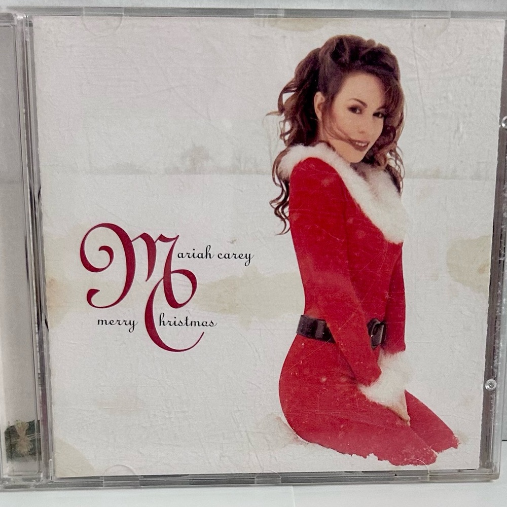 Merry Christmas by Mariah Carey. Pre-Owned. Tested & Played. Good.